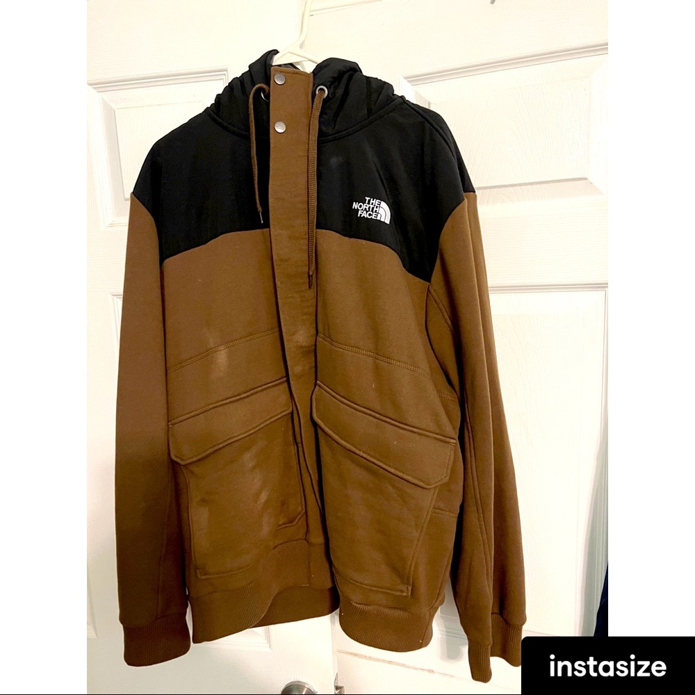 Mens North Face brown zip up jacket.